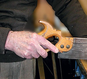 using a hand saw