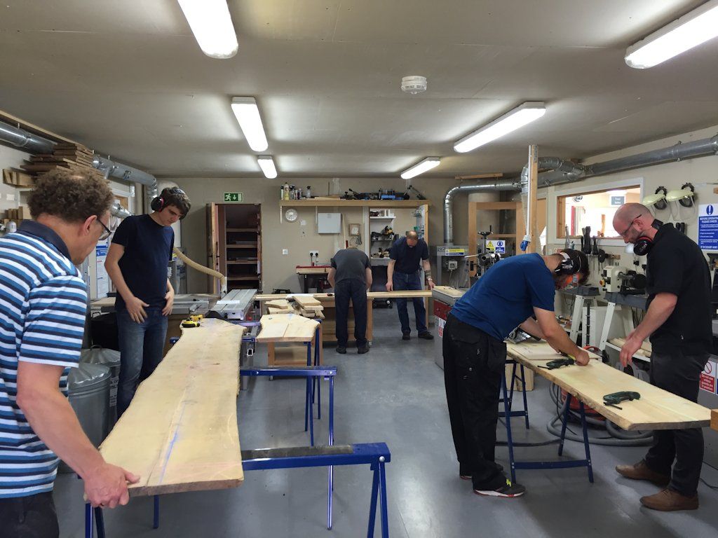 Students at Peter Sefton’s Furniture School reading the grain and marking out boards