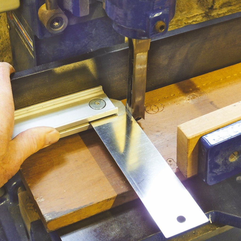 Squaring the chisel off the back fence of the mortiser