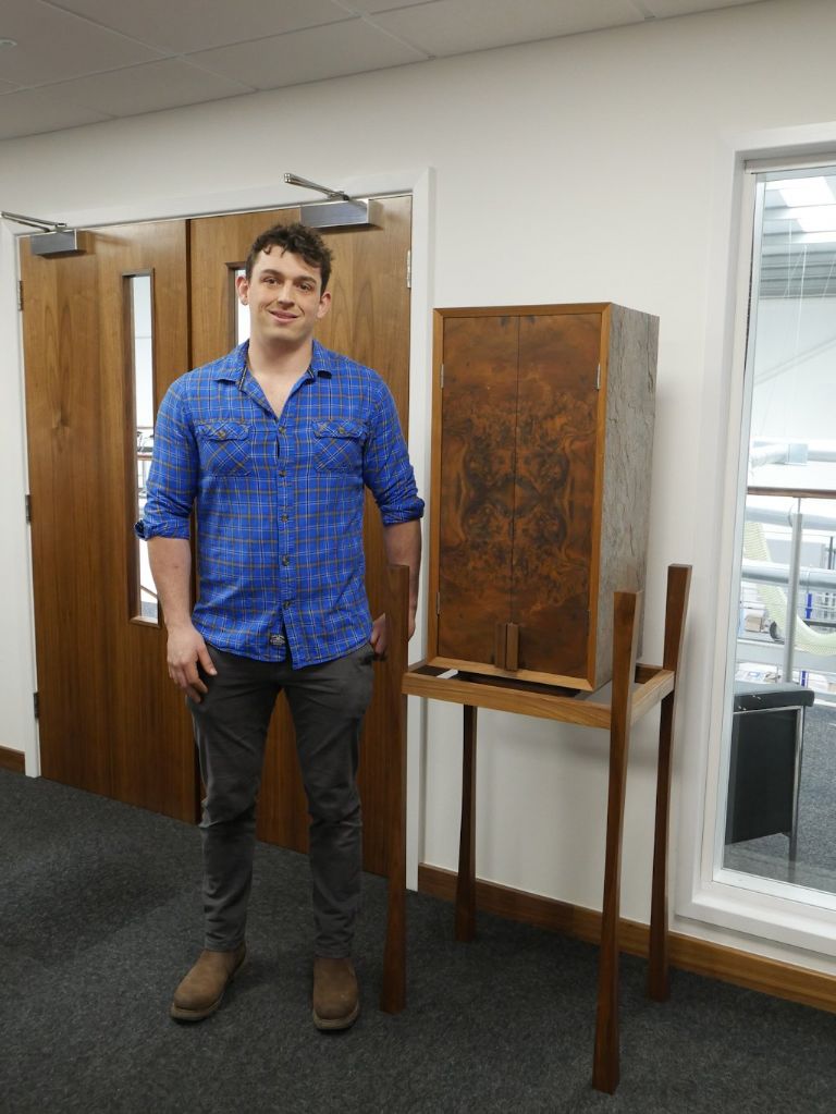 Nathan Millar with his winning walnut cabinet on stand