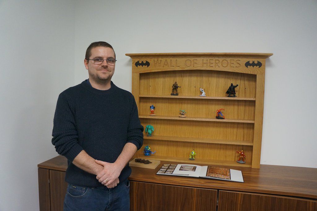 Jamie Lake beside his ‘Wall of Heroes’
