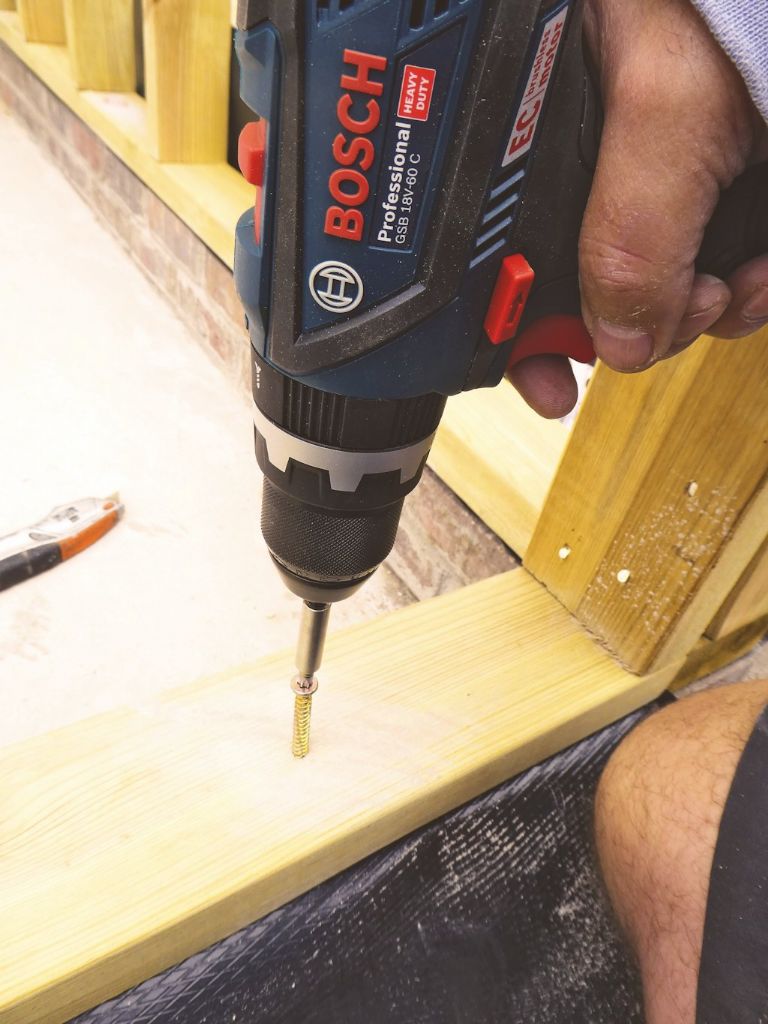 ... as well as driving concrete screws in to fasten the plates