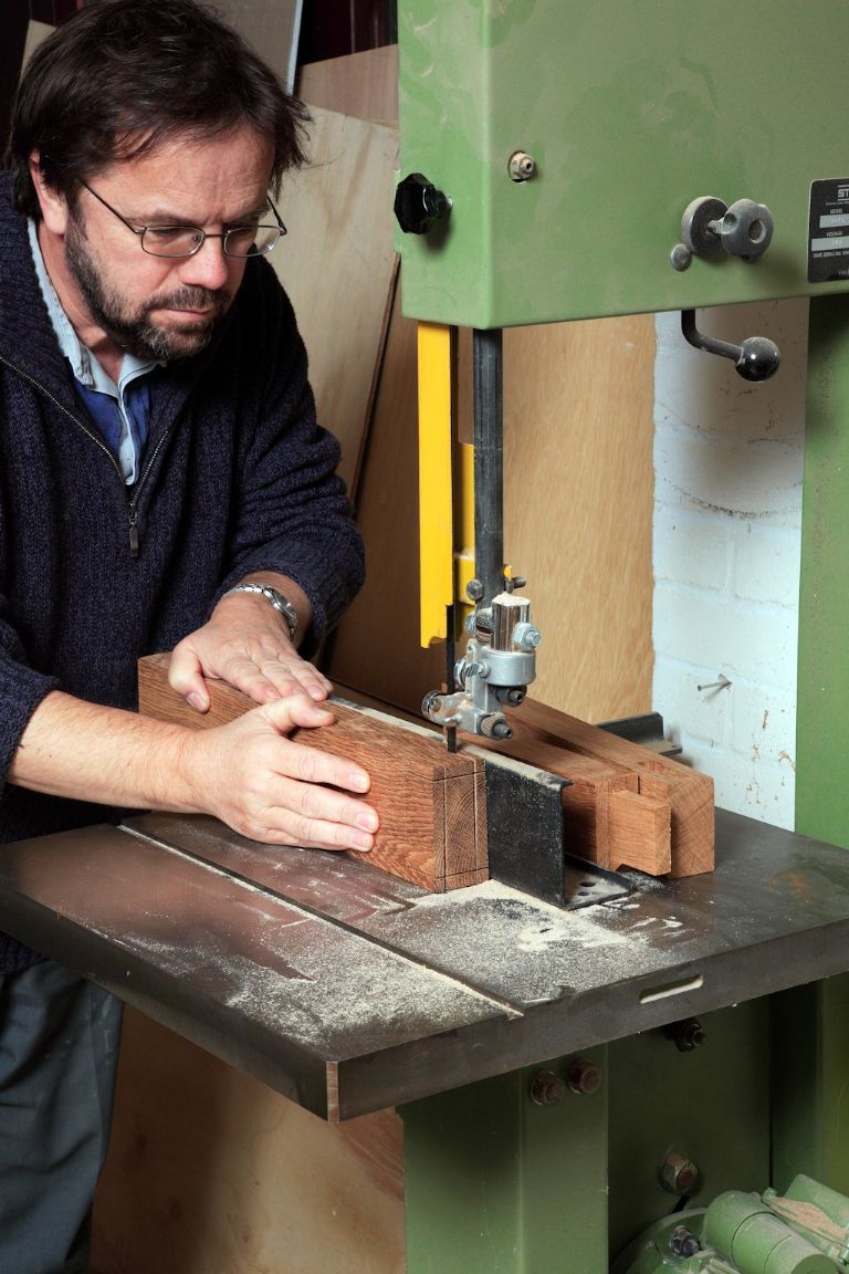 As John Bullar shows, the bandsaw is ideal for repeatedly cutting straight parallel-sided pieces, such as these large tenons