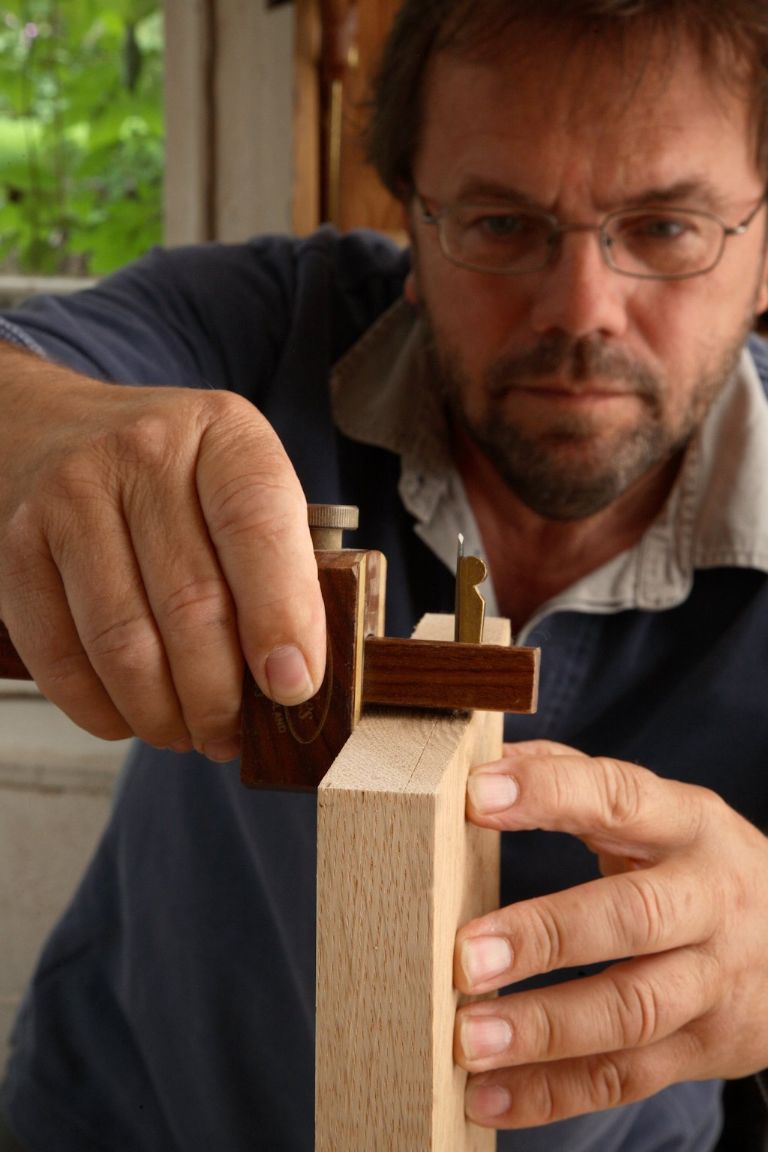 John Bullar marks a line across the end-grain at two-thirds of the thickness, representing the base of the sockets