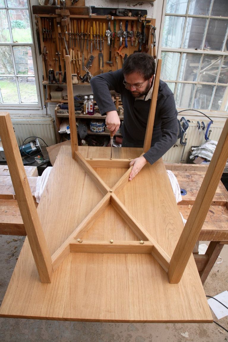 The simplest of straight leg support structures, says John Bullar, is braced by a hidden diagonal frame beneath the table top
