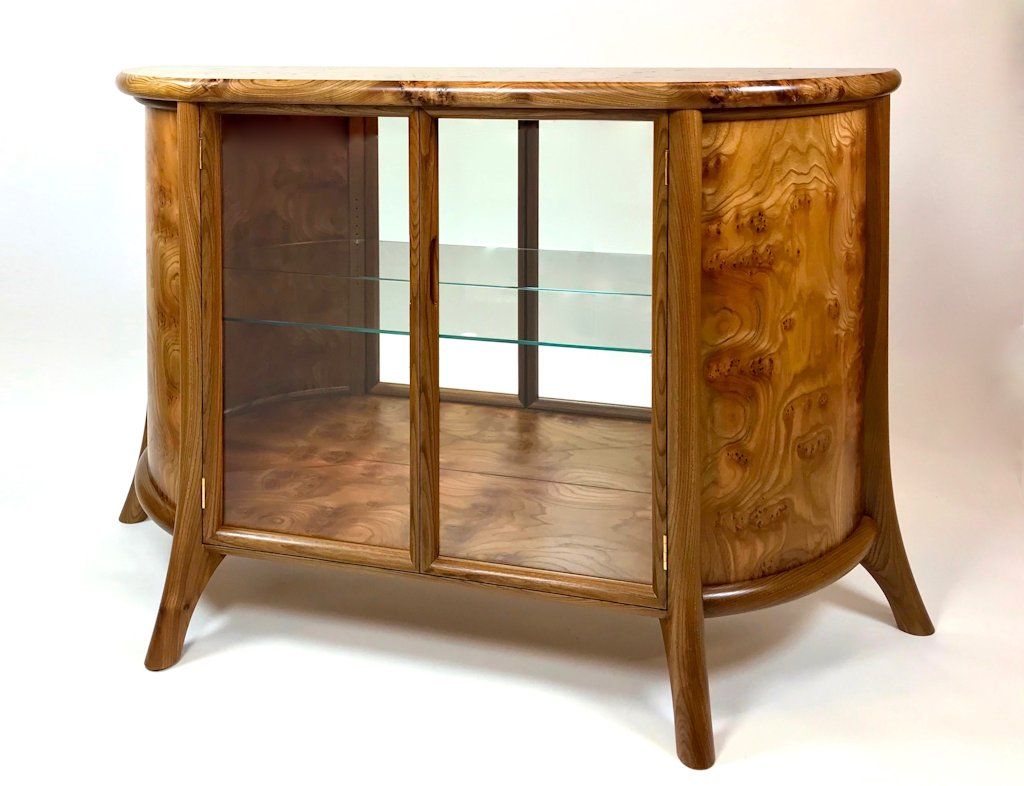 Lufu Furniture’s stunning ‘Eagon’ glassware cabinet in rare burr elm