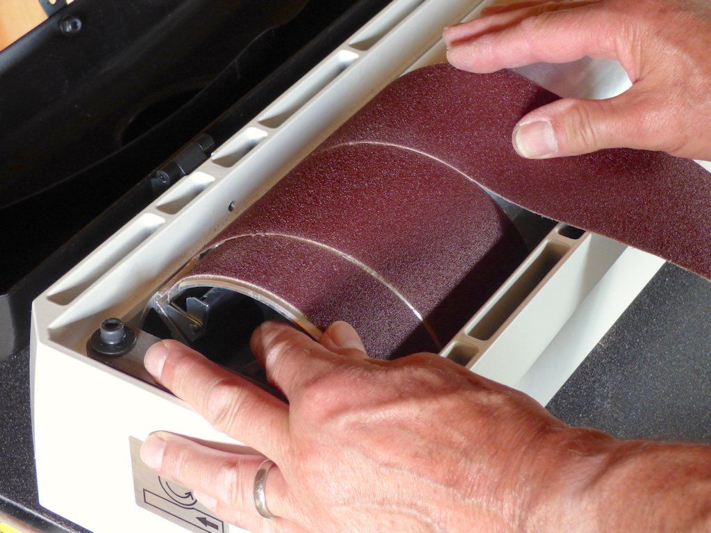Wrapping the belt around the drum on the JET JWDS 1632 drum sander is a cinch