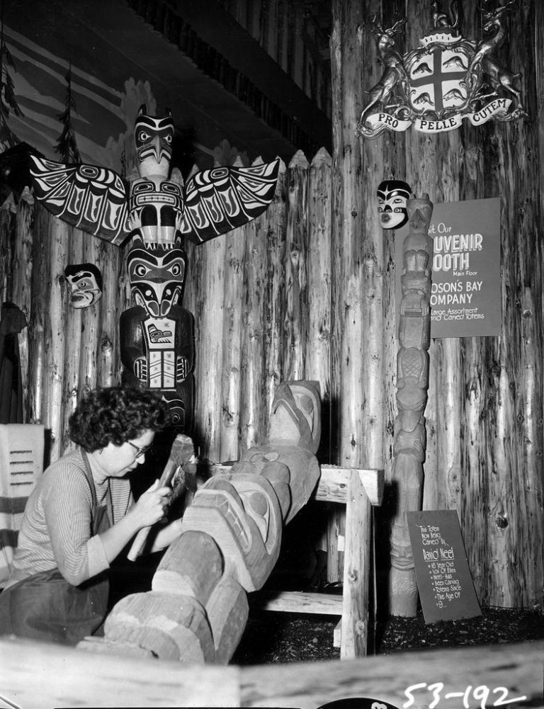 Kwakiutl carver Ellen Neel carving a totem pole