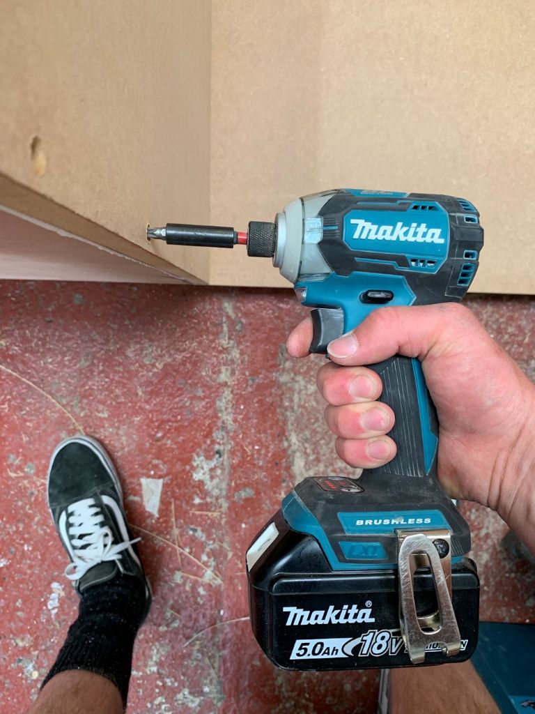 Inserting a standard screw into MDF using the Makita DTD170 18V cordless impact driver