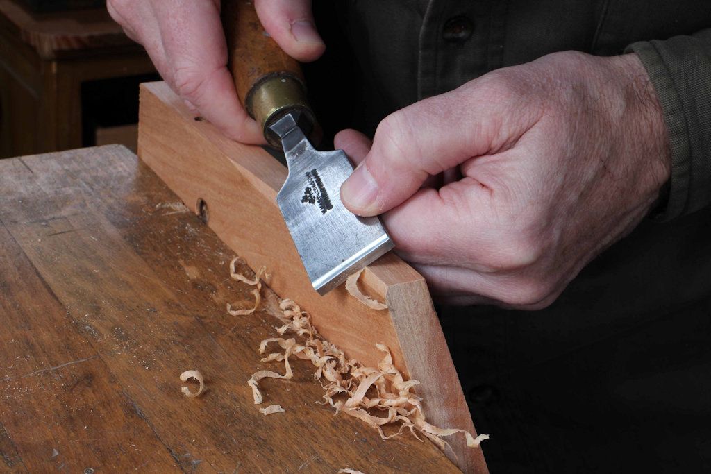 Robin Gates cutting a short chamfer in ash